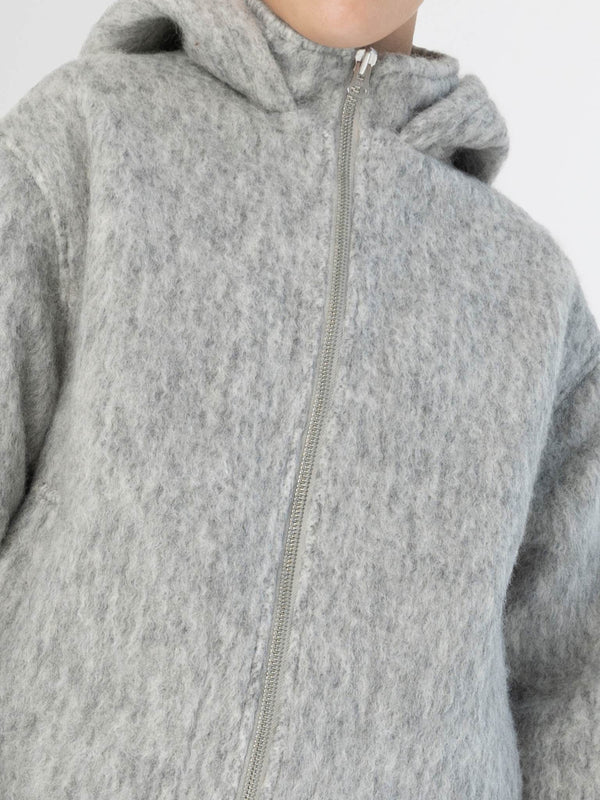 Grå fleecejakke med hætte og lynlås, perfekt til komfort og stil. MEOTINE tilbyder varme og moderne designs.