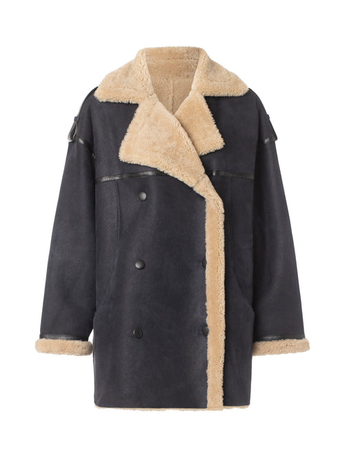 Mørkeblå jakke med faux pelskrave og detaljer, fra MEOTINE, perfekt til kolde dage med stil og komfort.